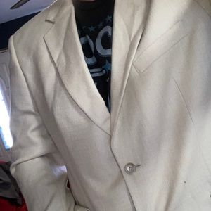 White dress coat cream colored.  Nice